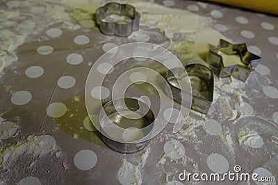 Metal cuttings for baking, flour, wooden rolling pill on table ready for bake. Baking concept Stock Photo