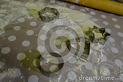 Metal cuttings for baking, flour, wooden rolling pill on table ready for bake. Baking concept Stock Photo