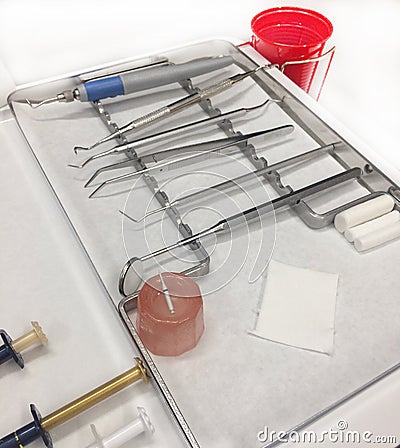 Metal dentistry tools put next to each other in a room Stock Photo