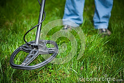 Metal detector in action Stock Photo