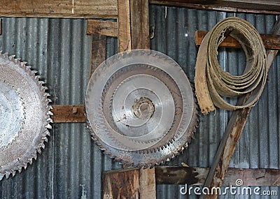 Metal discs for circular saws on the wall. Stock Photo