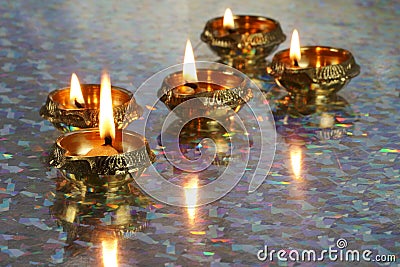 Metal Diyas lit up for the Indian Hindu festival of Diwal Stock Photo