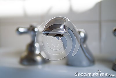 Metal faucet Stock Photo