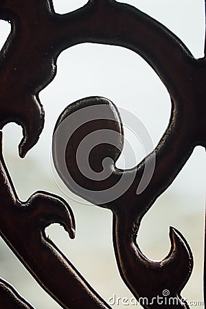 Metal fence, bends. Monogram, vintage and classic Stock Photo