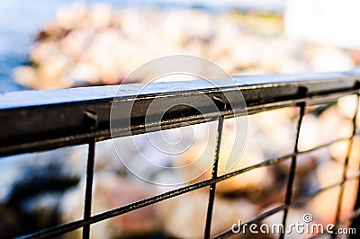 Metal Fence With Natural Outdoor Light And Soft Focus Background Stock Photo