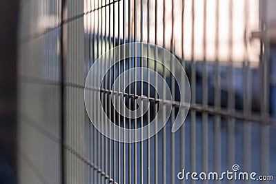 Metal fence on a street Stock Photo