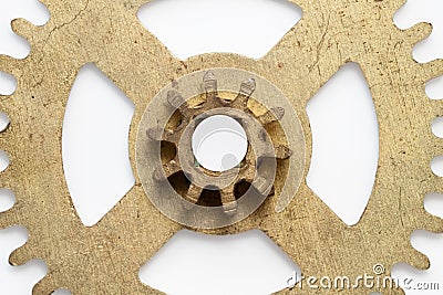 Metal golden color copper gear wheel isolated with white background Stock Photo