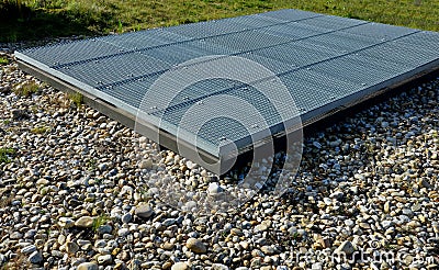 metal grates and a hatch on the roof garden. Stock Photo