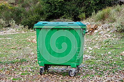 Metal green garbage Stock Photo