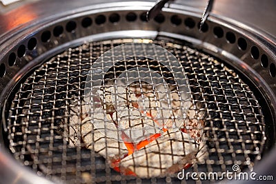 Metal grilled and charcoal in restaurant Stock Photo