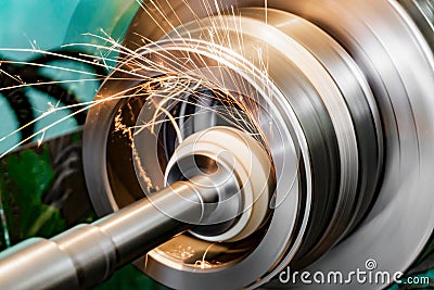 Metal grinding, internal grinding with an abrasive wheel on a high-speed spindle of a circular grinding machine Stock Photo