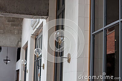 Metal lighting lamp on the wall Stock Photo