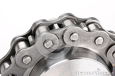 Metal link chain and cogwheel Stock Photo