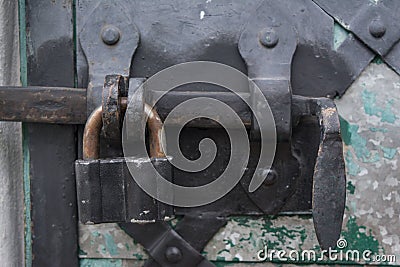 Metal lock on door into the ancient trinity christian ortodox church Stock Photo