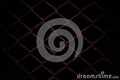 Metal Mesh Fence on black background. Stock Photo