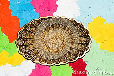 metal oval around when colorful shredded papers, creative art design Stock Photo