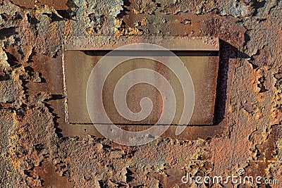 Metal panel in a wall with varying degrees of extreme rust patina, creative copy space Stock Photo