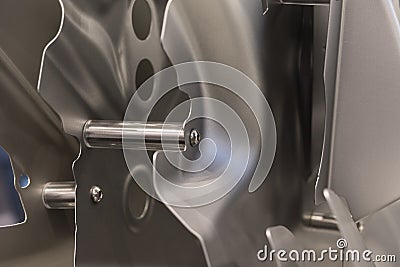 Metal parts of a car in automotive production Stock Photo