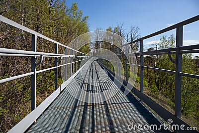 Metal pedestrian bridge Stock Photo