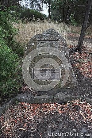 Metal plaque on a stone cairn commemorating William Buckley, an escaped prisoner who lived with the Aboriginals in Buckleys Falls Editorial Stock Photo