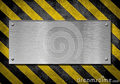 Metal plate background with hazard stripes Stock Photo