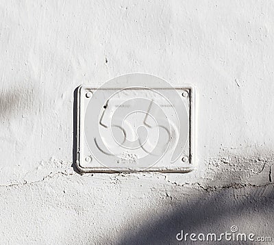 Metal plate painted with wall paint showing number 55 Stock Photo