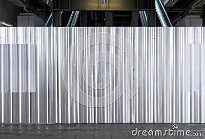 Metal plate sheet fence seamless surface of galvanized steel texture corrugated for wall in a construction site and Industrial Stock Photo