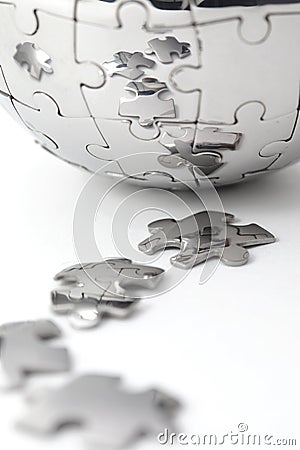 Metal puzzle globe close-up Stock Photo