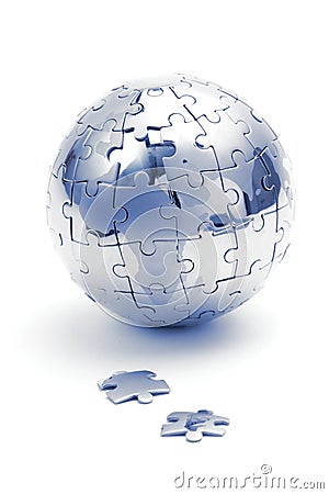 Metal puzzle globe, close-up in blue light Stock Photo