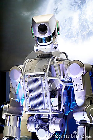 Metal robot on space background Stock Photo