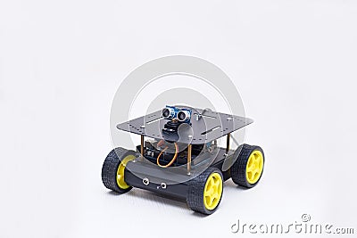 Metal robot on wheels on white background Stock Photo