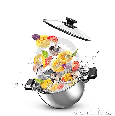 Metal saucepan with pasta and vegetables in water, Stock Photo