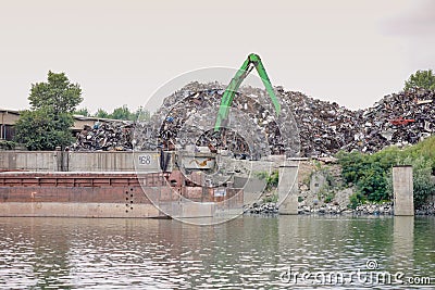 Metal scrapyard on the banks of the Danube river Editorial Stock Photo