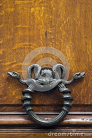 Metal snake door knocker Stock Photo