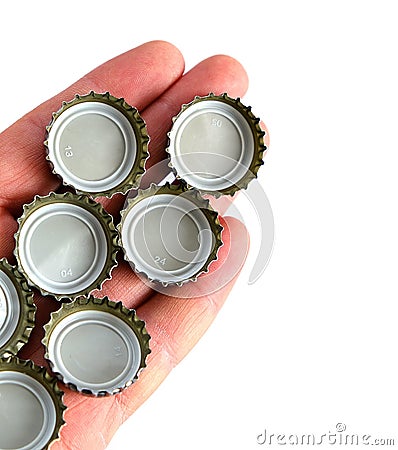 Metal soda bottle caps, soda caps, close-up on white background Stock Photo