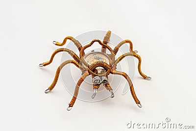 Metal spider with built-in clockwork on white background, steampunk style Stock Photo