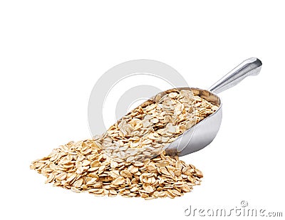 Small metal spoon or scoop with dry rolled oats seen isolated on white background Stock Photo