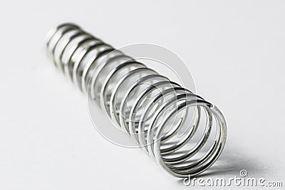 Metal spring isolated on white background Stock Photo