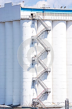 Metal stairs on grain elevator Stock Photo