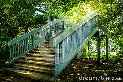 Metal stairs in the woods Stock Photo