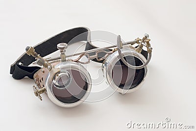 Metal steampunk glasses, google on white background, close up Stock Photo