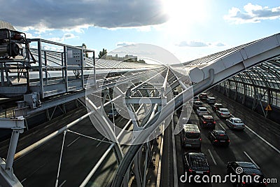 Cars on the road in the sound-absorbing tunnel. Stock Photo