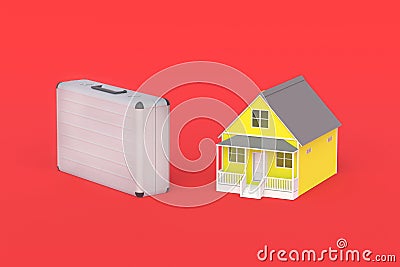 Metal suitcase near house. Registration of documents at home. Investing in construction Stock Photo