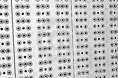 Metal surface many small holes hard weathered base industrial background texture design base site Stock Photo