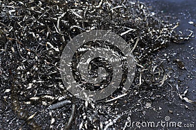 Metal swarf chips scrap cng milling iron close-up Stock Photo