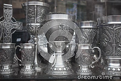 Metal tankards and globets. Typical Irish crafts Editorial Stock Photo