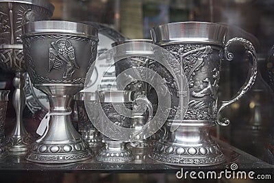 Metal tankards and globets. Typical Irish crafts Editorial Stock Photo