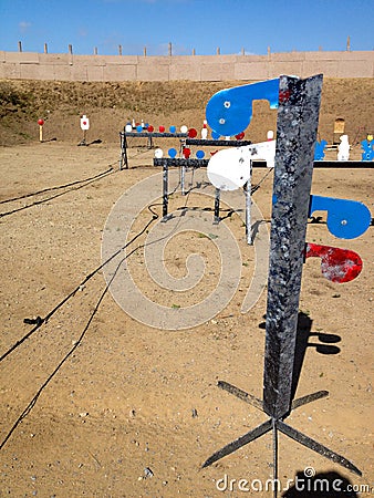 Metal targets at shooting range outdoor firearm rifle shotgun practice Editorial Stock Photo