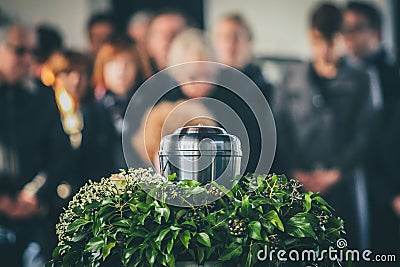 Metal urn at a funeral Stock Photo