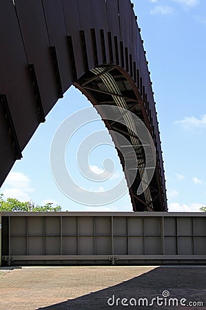 Metal walkway over a fence Stock Photo